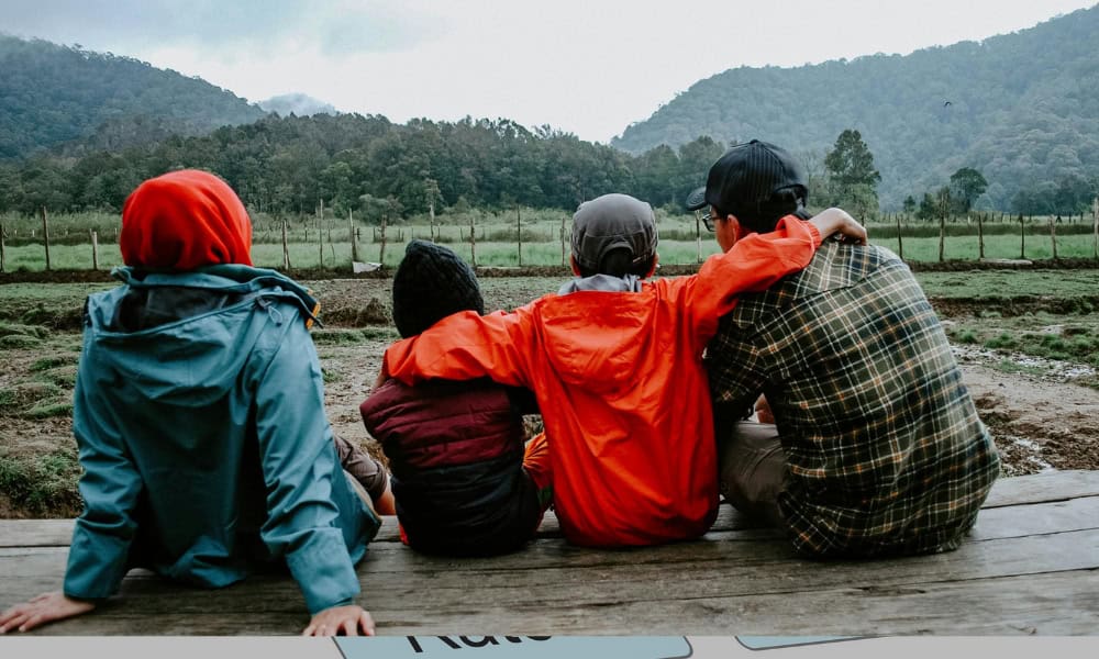 family in a rainy forrest