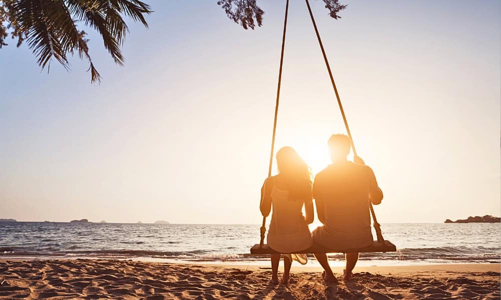 couple at beach during sunset