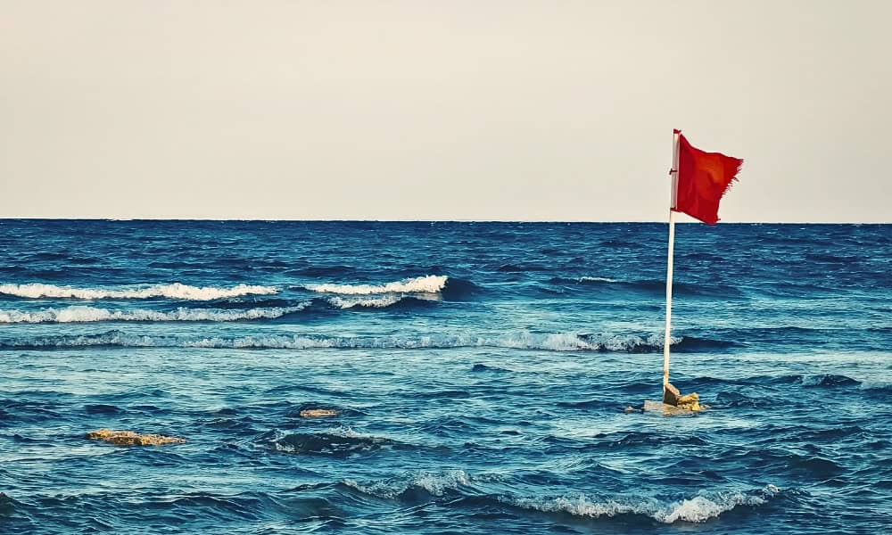 red flag in sea